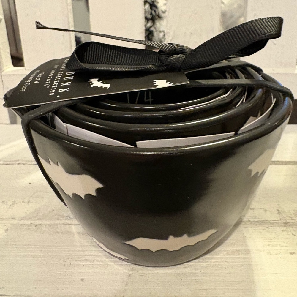 Rae Dunn Black Measuring Cups with White Bat Design